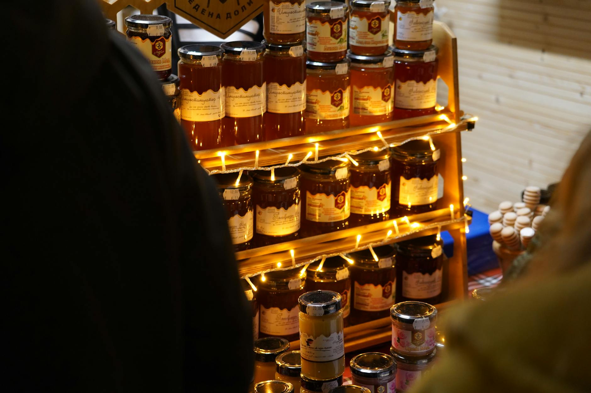 illuminated display of assorted honey jars