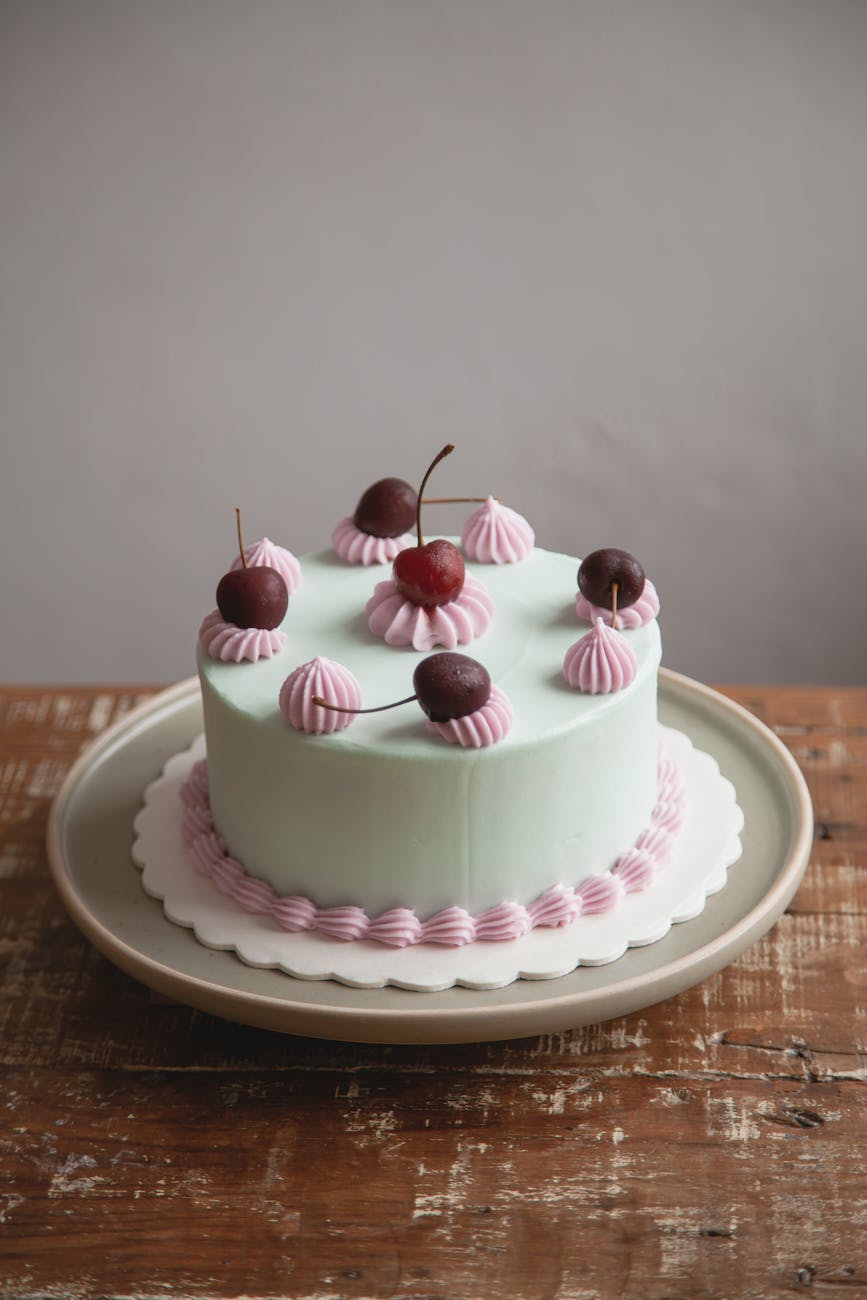 a cake with cherries